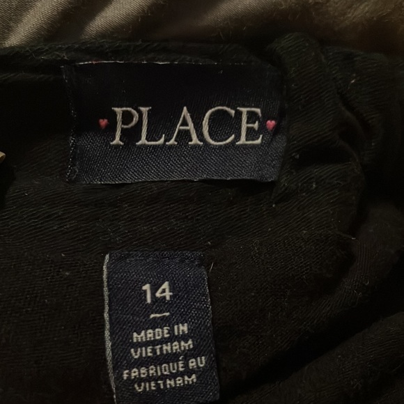 Short black skirt with decorative buttons - Picture 4 of 6